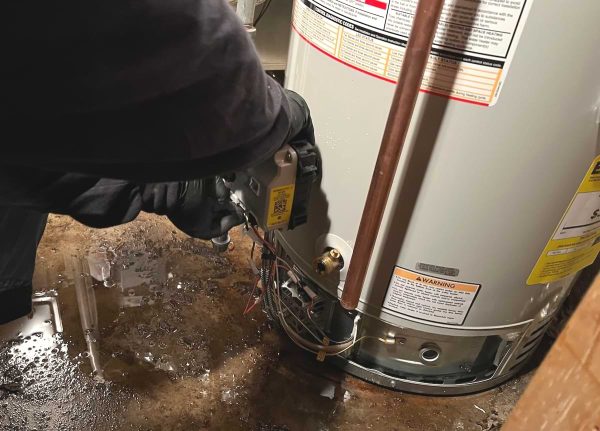 water heater leaking from base