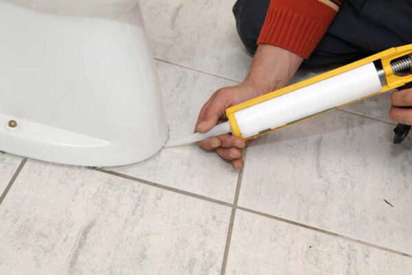 caulking base of toilet