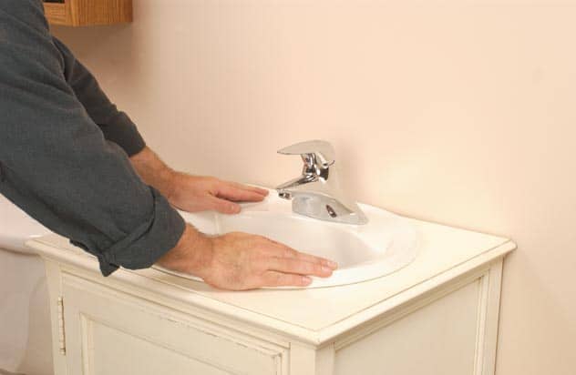 install self rimming sink