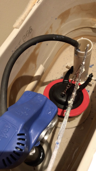 testing flapper chain inside toilet tank