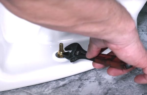 tighten nuts onto mounting bolts