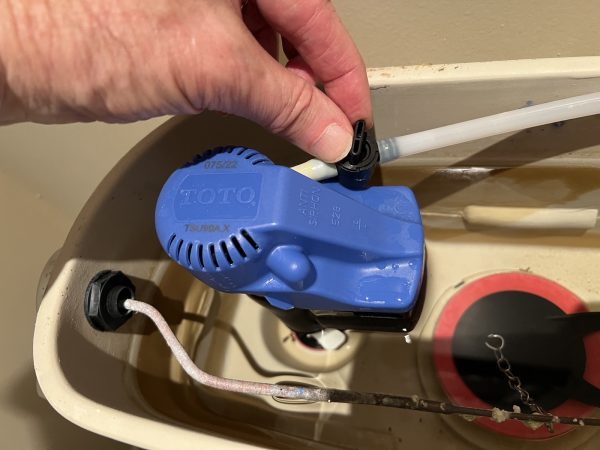 adjust toilet fill valve
